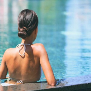 woman lounging in pool